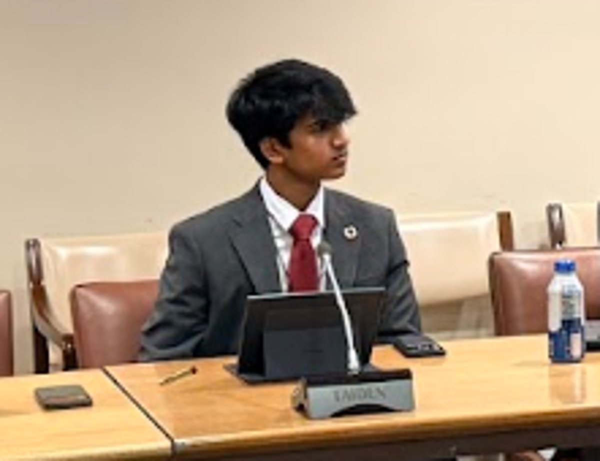 At the delegate desk